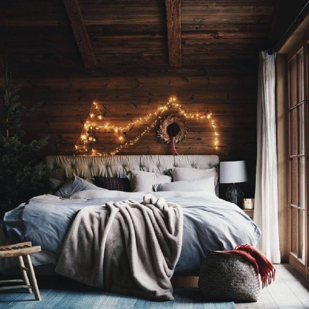 Cozy winter bedroom decorated for holidays in rustic cottage - @sehomes. #cozywinter #cozychristmas #wintervibes