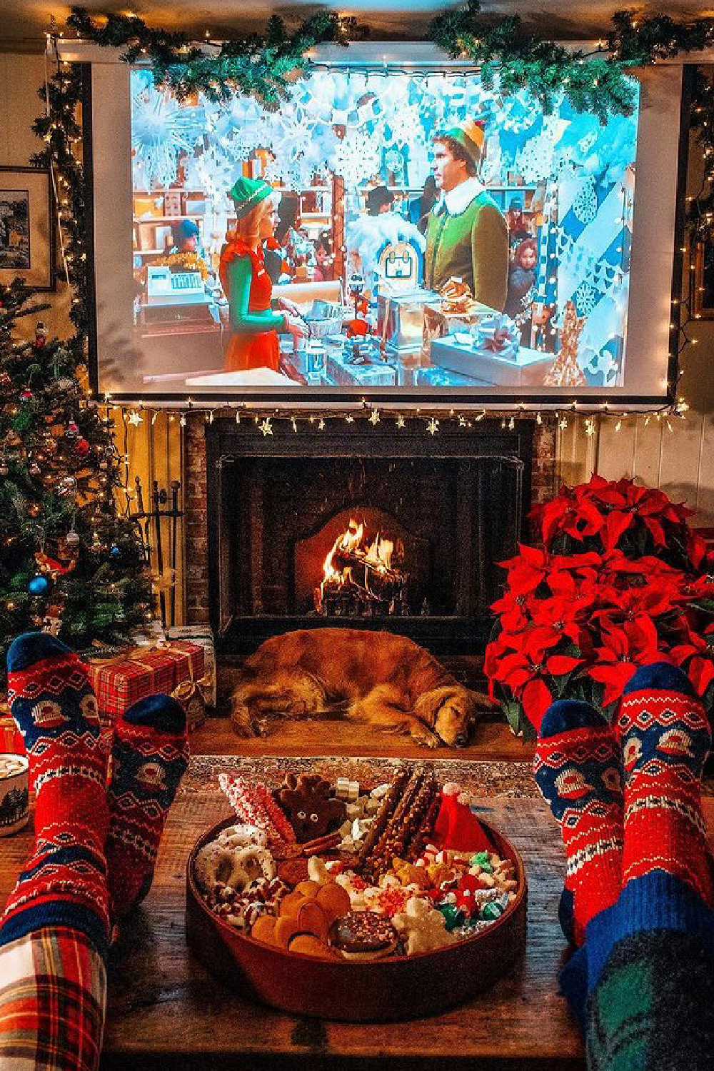 Elf movie night projected in Christmas cozy living room - @tilldeathdousart. #elfmovienight #christmascozy