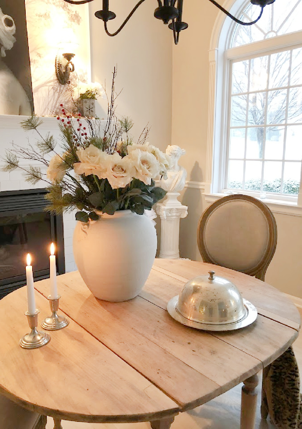 Our renovated dining room turned music room at the Georgian has arched windows, light greyed oak floors, and European country style - Hello Lovely Studio.