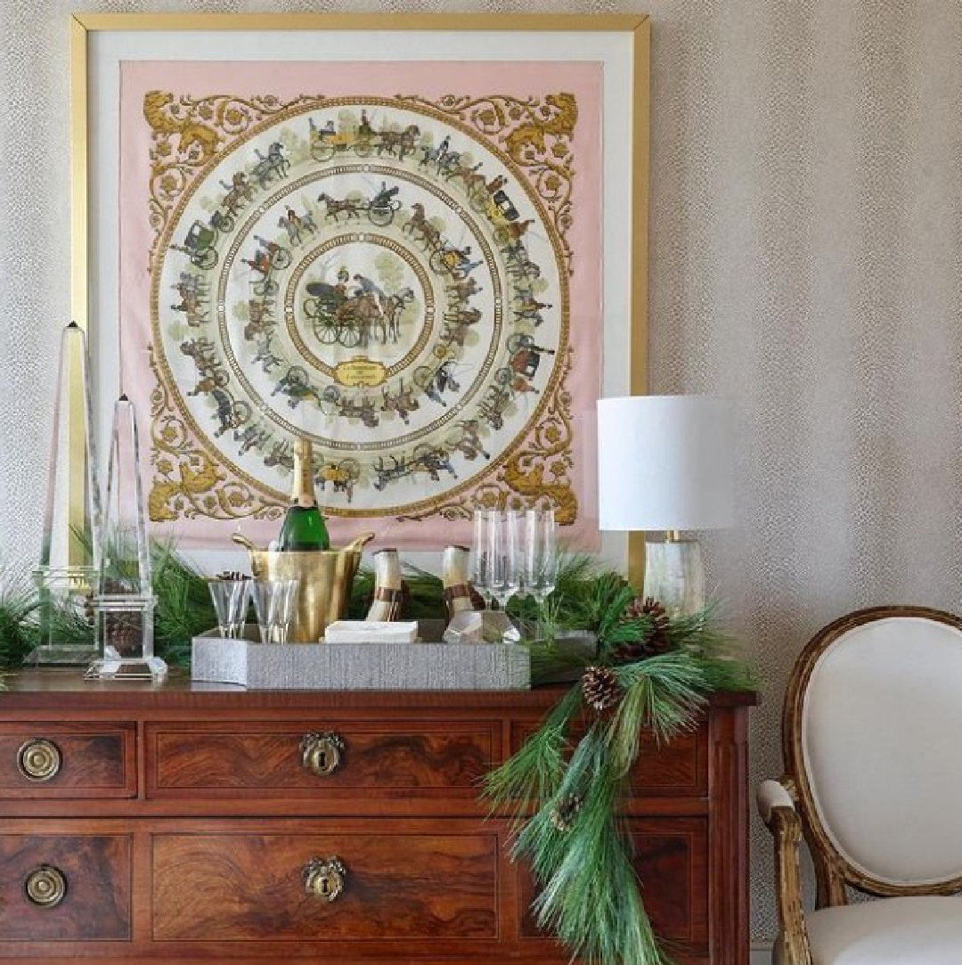 Beautiful framed Hermes scarf above a bar - Huff Harrington Design in Atlanta Holiday home.