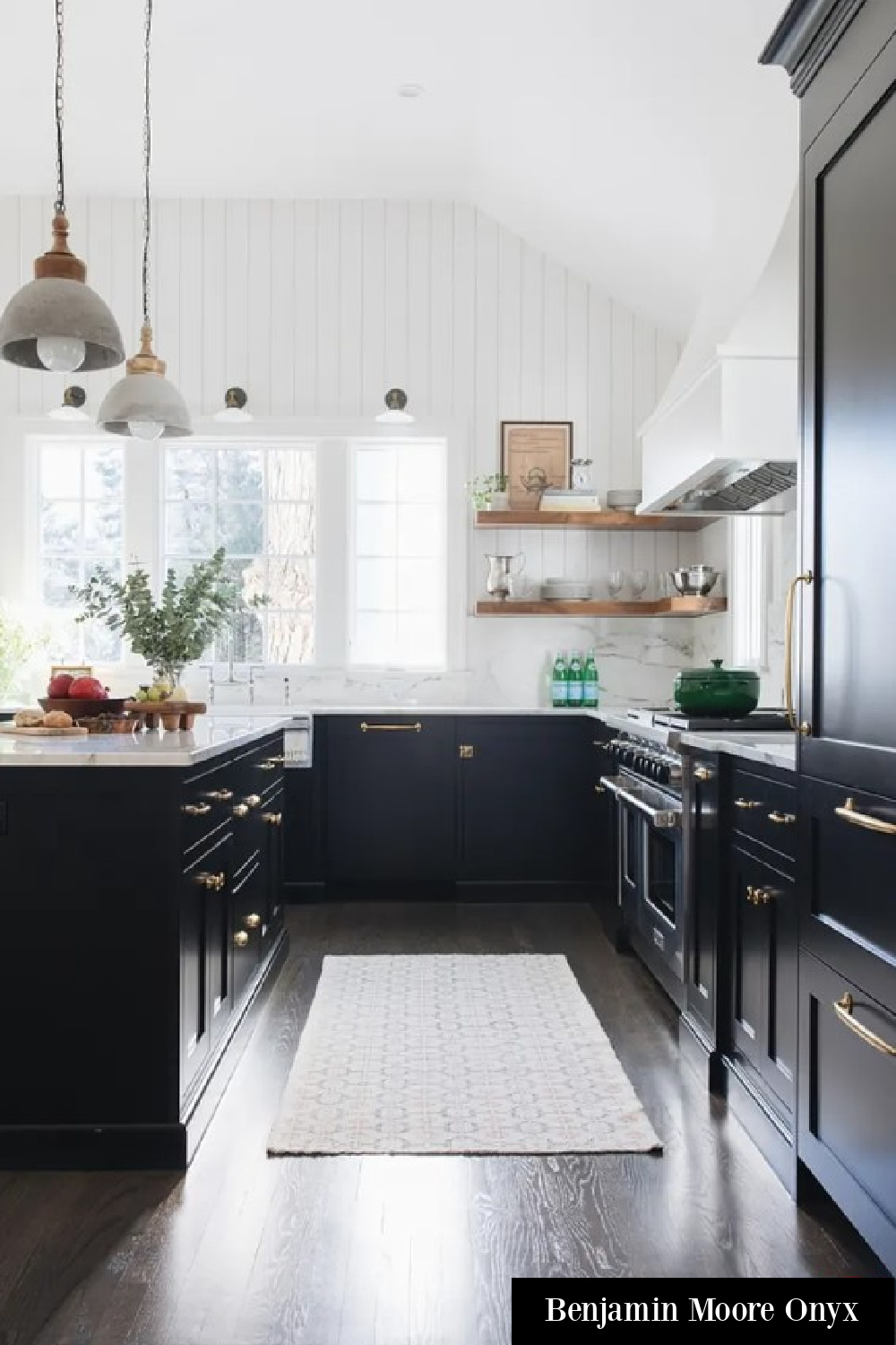 Kitchen with black kitchen cabinets painted Benjamin Moore Onyx - @reDesign Home