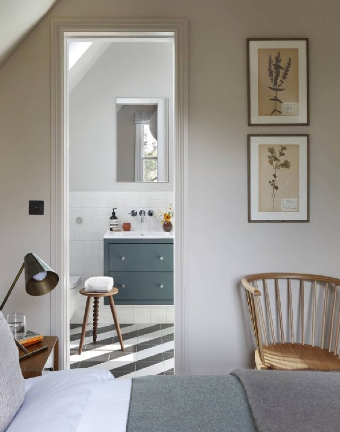 Christian Bense designed bedroom and bath with serene mood, stripe floor tile, and minimal modern style. #minimalmodern