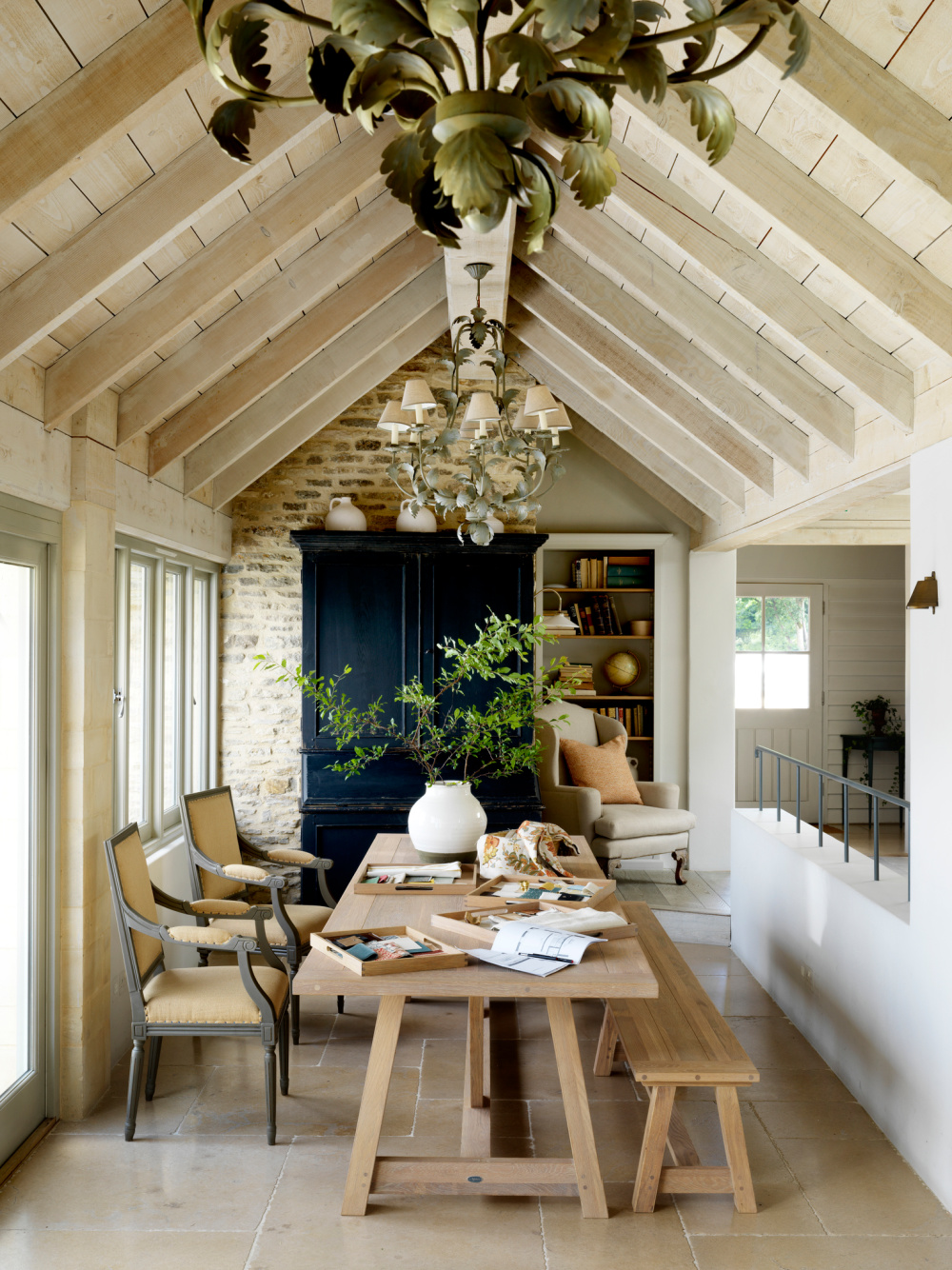 Rustic English Country garden room in a barn conversion - design by Sims Hilditch in THE EVOLUTION OF HOME (Rizzoli, 2022).