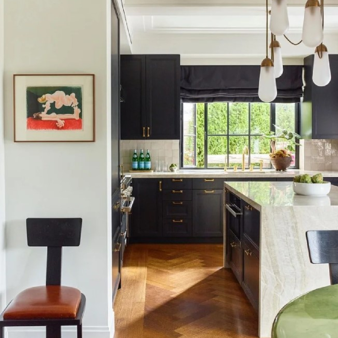 Farrow and Ball Off-Black No. 57 black kitchen cabinets in a beautifully designed kitchen by @benjaminvandiver. #blackkitchencabinets