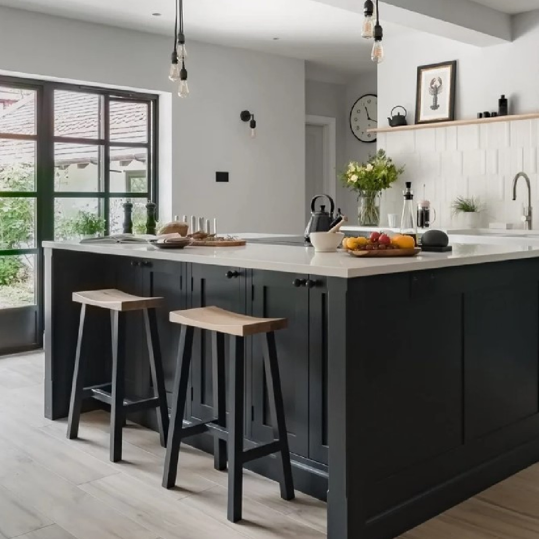 Farrow and Ball Off-Black No. 57 black kitchen cabinets in a beautifully designed kitchen by @sherekitchens. #blackkitchencabinets