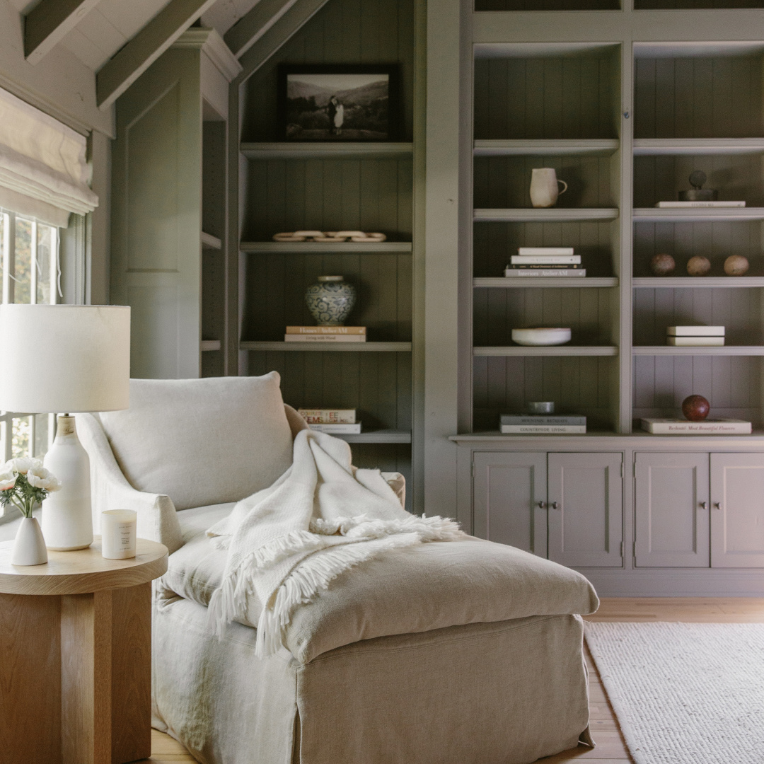 Deep earthy green walls in a gorgeous rustic modern luxe living room in Jenni Kayne's Canyon Chateau project. #jennikaynehome #greeninteriors