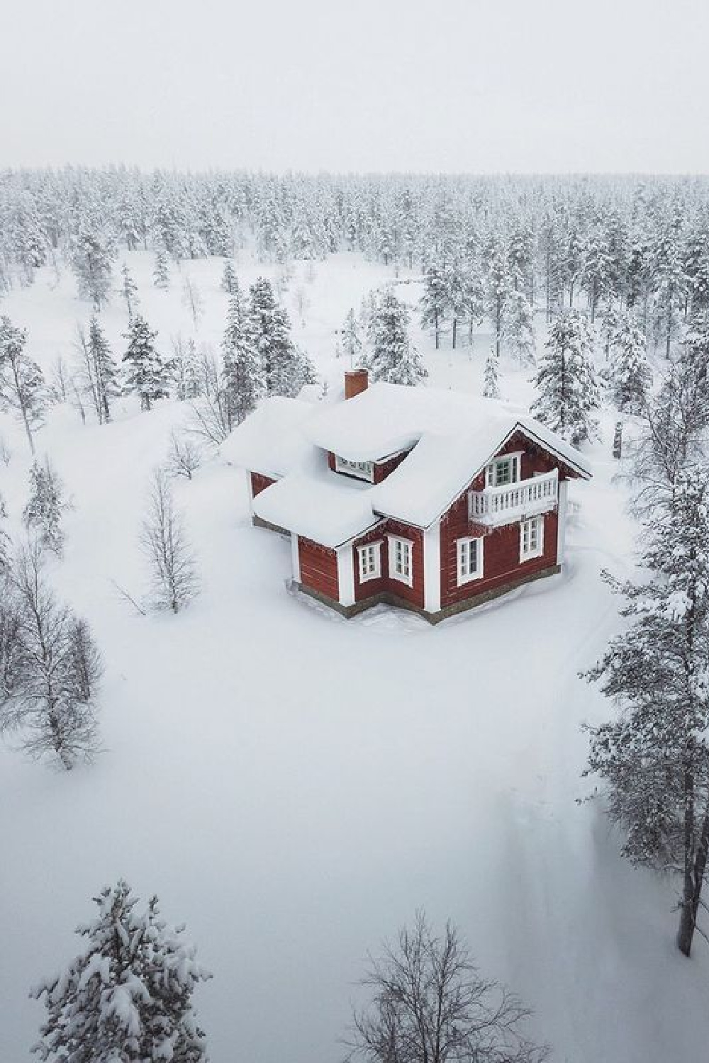 Cozy red winter cabin in snowy woods - @monders. #christmascabins #snowywoods