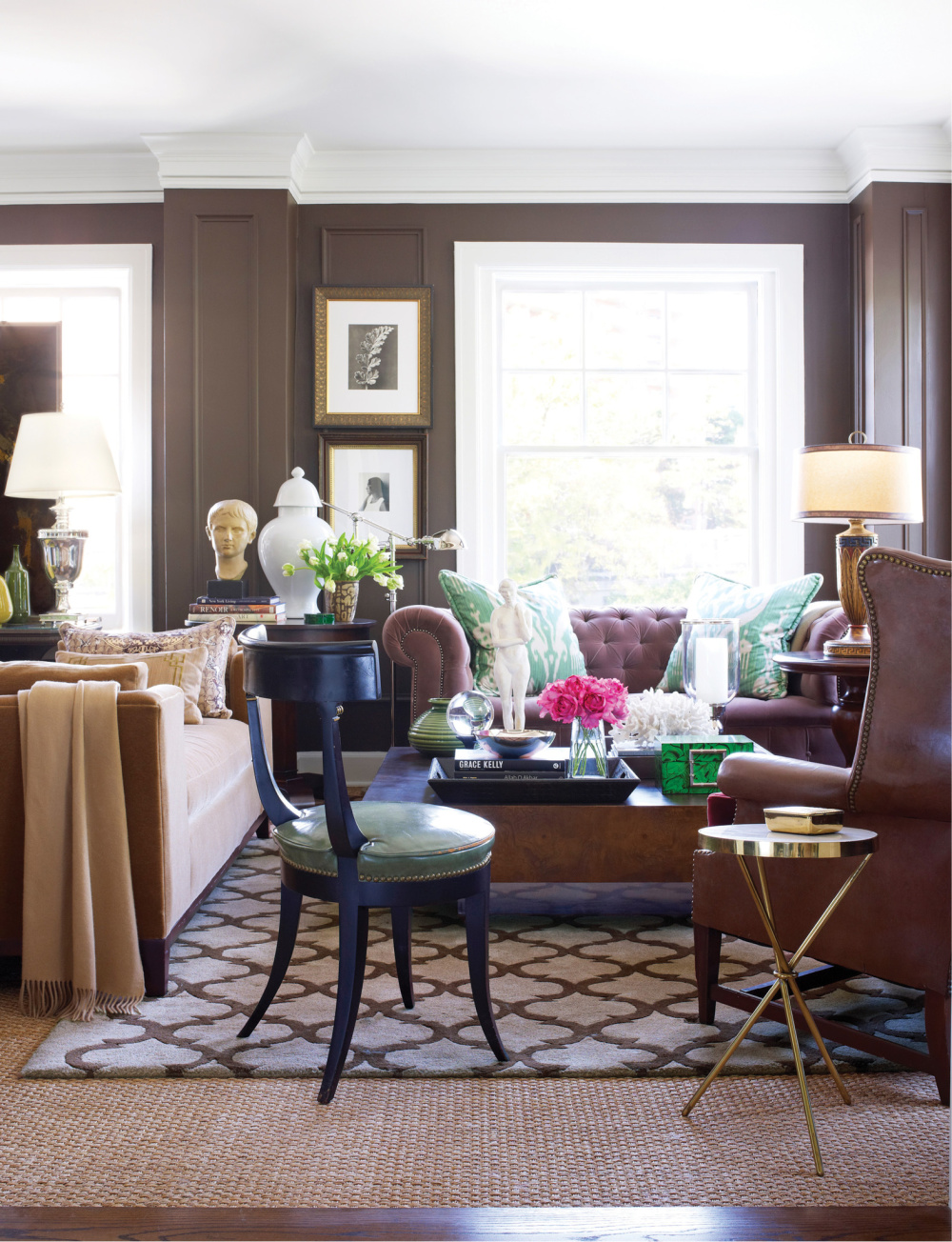 Deep chocolate brown walls in an elegant interior by David Jimenez in PARISIAN BY DESIGN (Rizzoli, 2022). #parisianinteriors