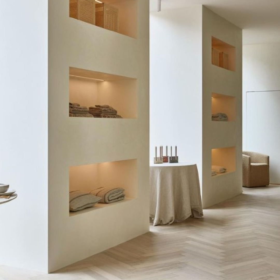 Cultiver's elegant minimal modern shop interior with herringbone flooring and beautifully lit plaster niches - design by PhoebeNicol.Interiors, photo by Dave_Wheeler. #minimalluxestyle #herringbonefloors