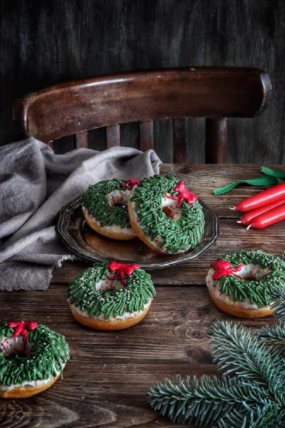 Christmas donuts decorated as wreaths on rustic farm table - #svet.morozova.