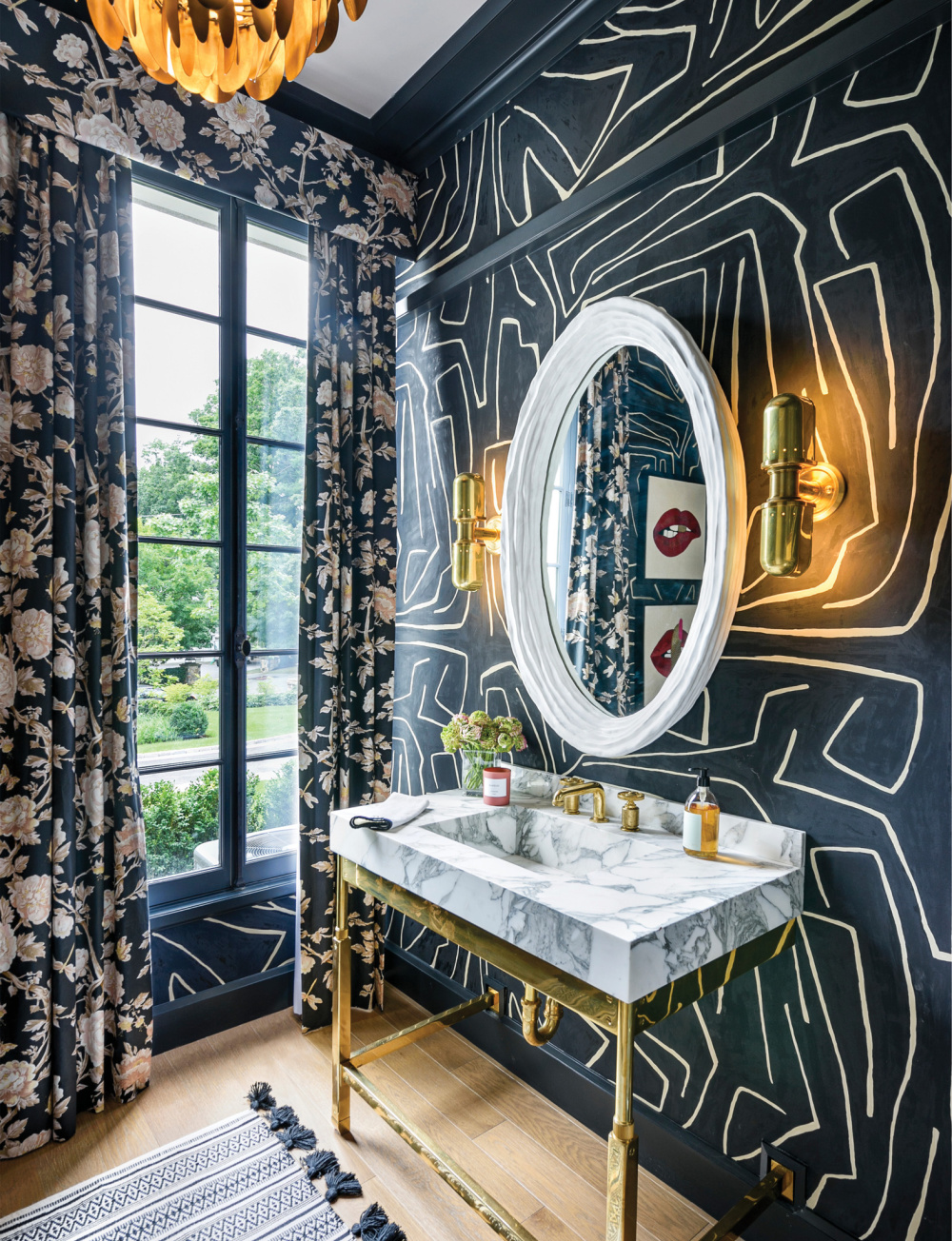 Bold luxurious fantasy powder bath with marble console sink and deep blue - in THE ULTIMATE BATH by Barbara Sallick (Rizzoli, 2022).