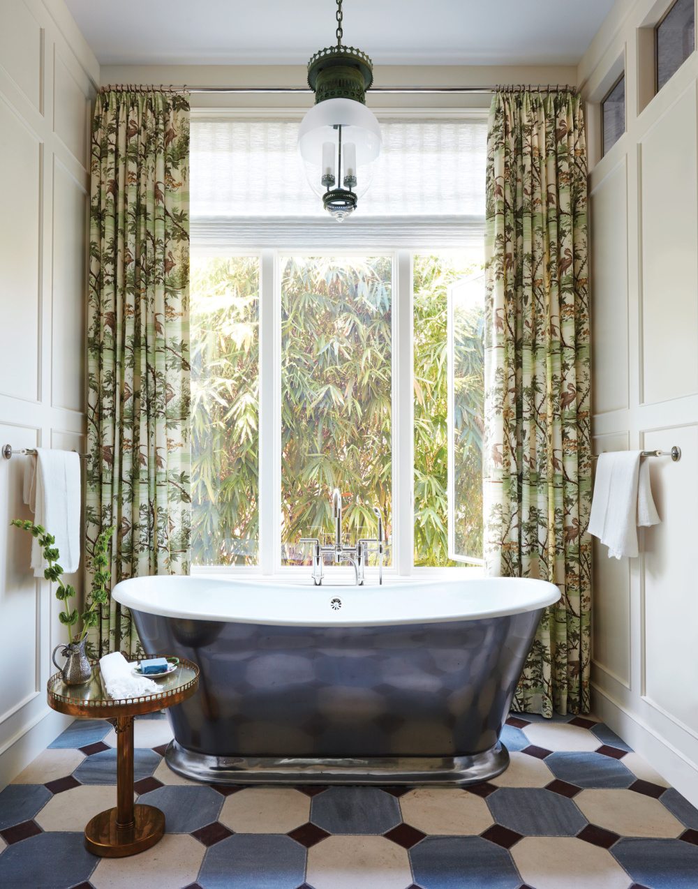 Luxurious fantasy bath with soaking tub in front of large window - in THE ULTIMATE BATH by Barbara Sallick (Rizzoli, 2022).