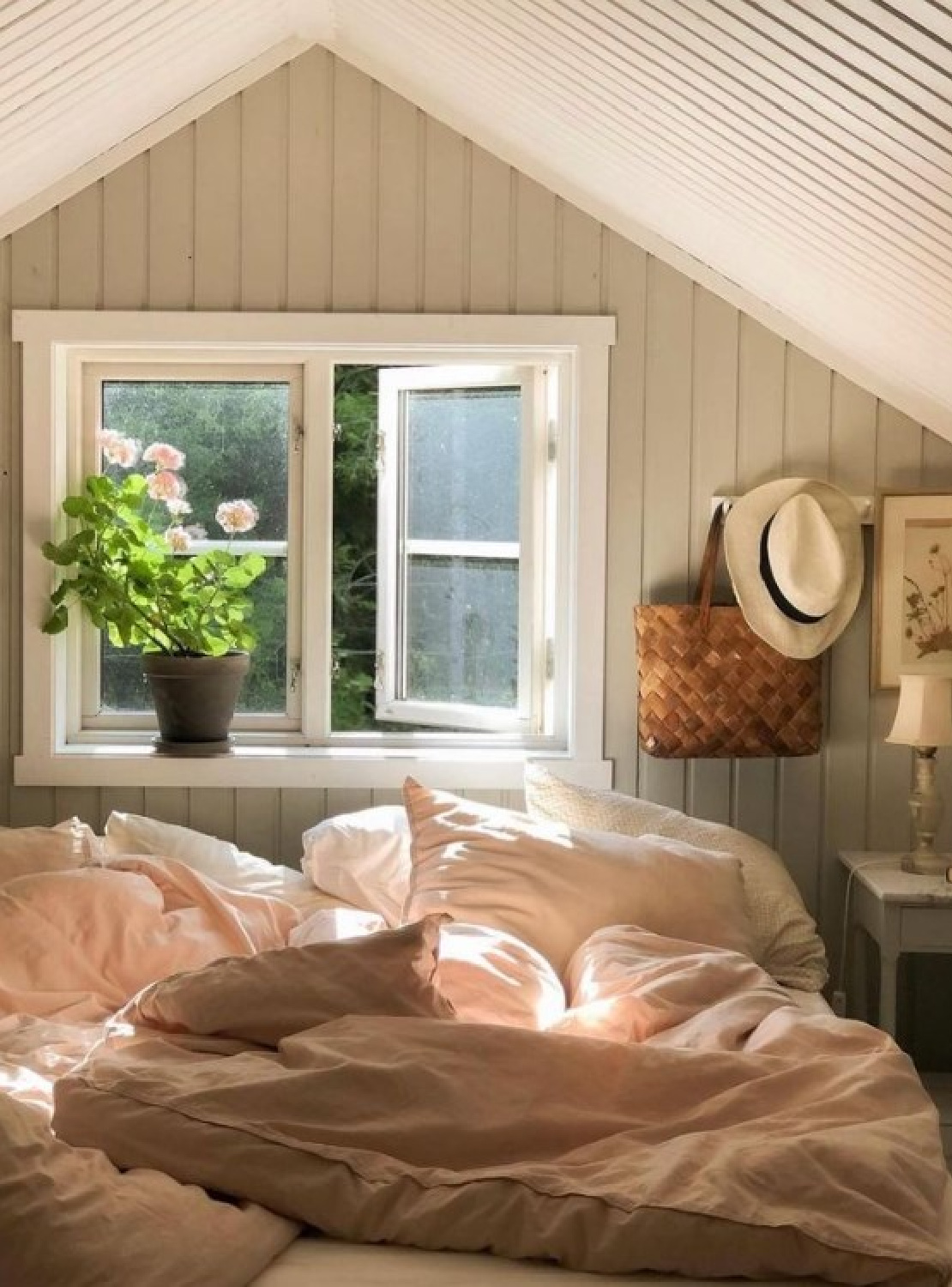 Romantic country house bedroomw ith tongue and groove sage green paneling, pink bedding, and natural light dancing - @bynilsgarden. #countrybedroom #tongueandgroove