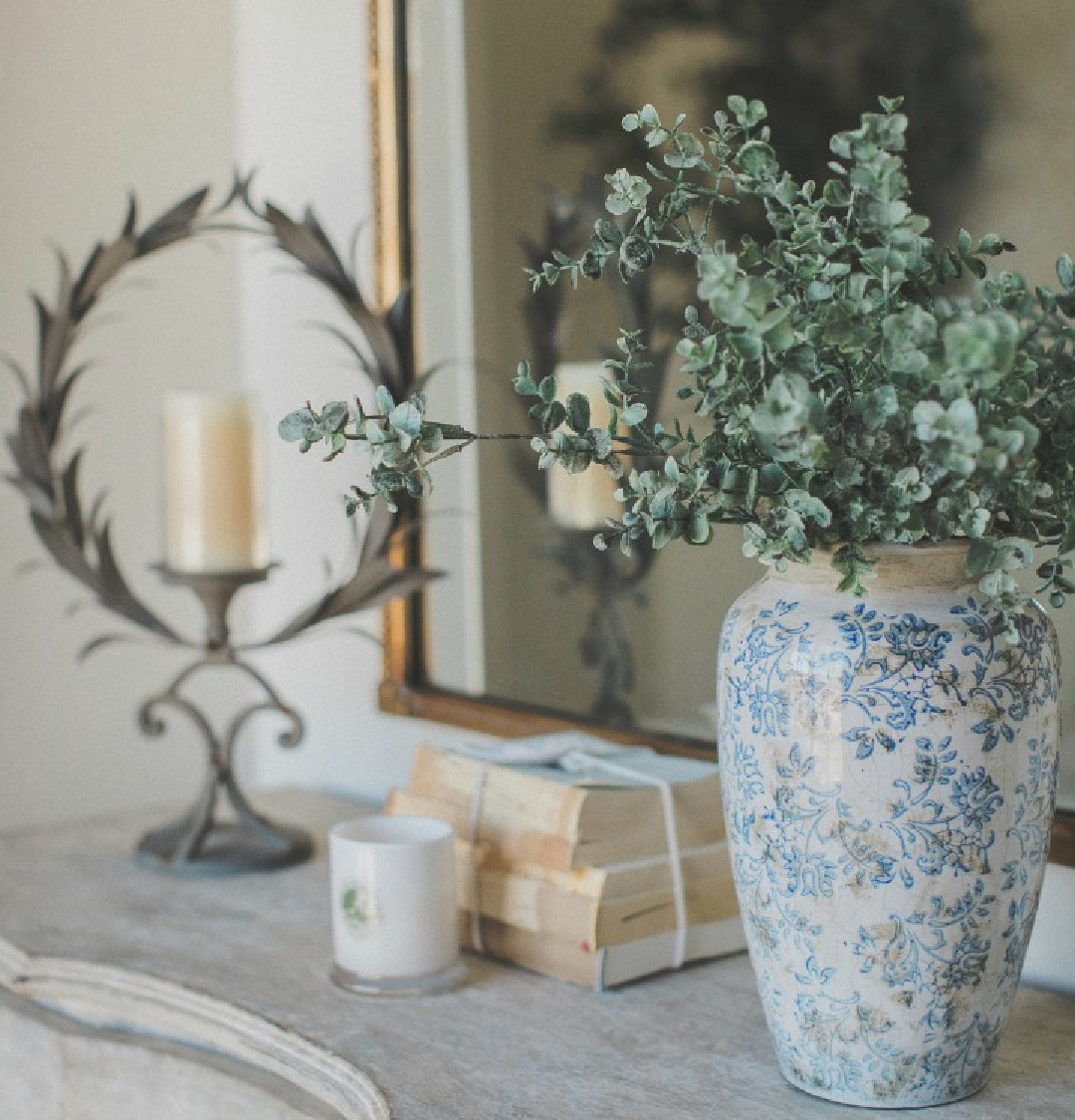 French country farmhouse decor on a console in an entry. Brit Jones Design.