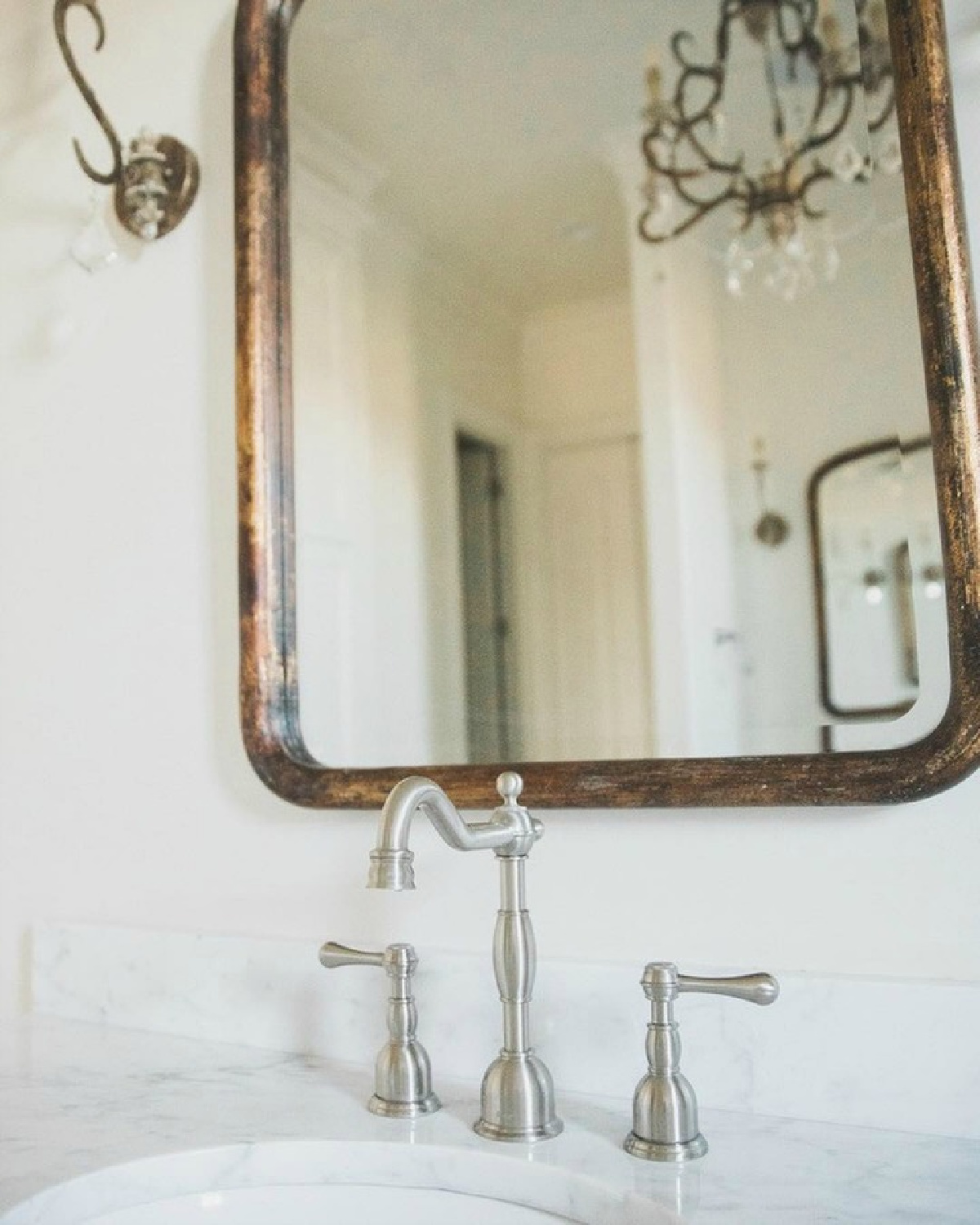 French country farmhouse bathroom with Sherwin Williams Alabaster paint color on walls. Brit Jones Design.