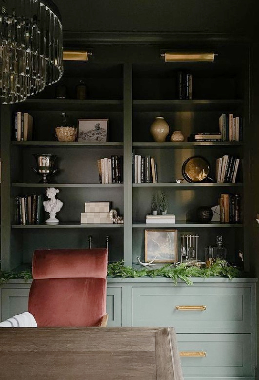 Sherwin-Williams Rosemary painted built-ins in a home office by Emily White @werethewhites_. #sherwinwilliamsrosemary