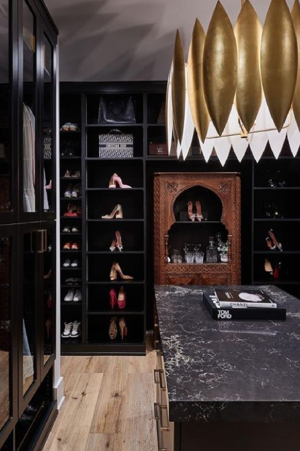 Bespoke fantasy closet in black by Alison Victoria - photo by Anthony Tahlier.