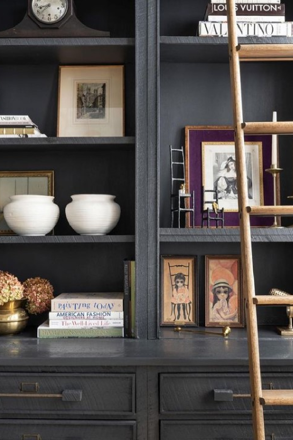 Built-in shelves in Alison Victoria designed Atlanta loft on HTV's Windy City Rehab. Photo: Rustic White Interiors; Styling: Courtney Favini. House Beautiful.