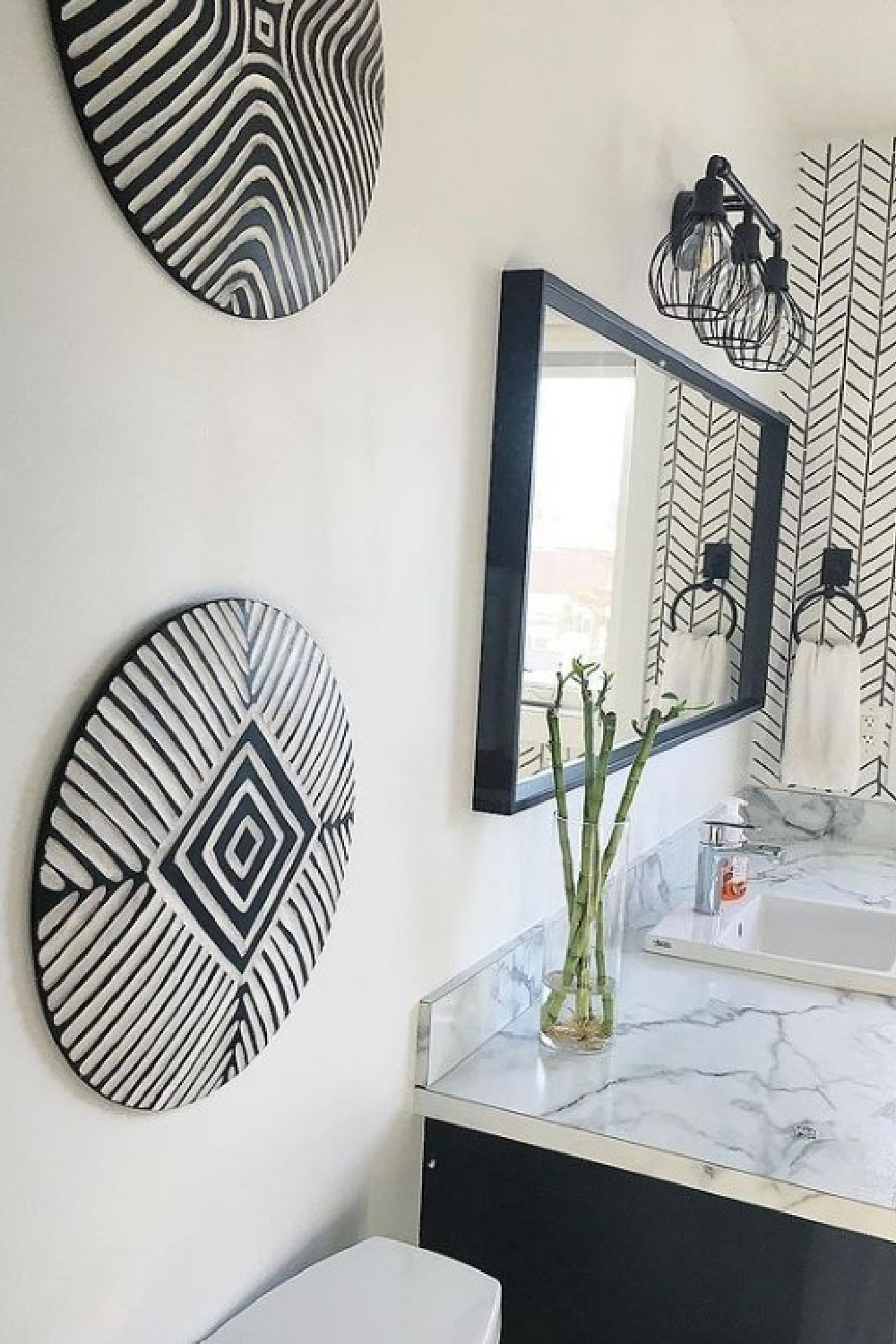 Modern bathroom with black accents and walls painted BM Decorator's White - Chase Home Interiors.