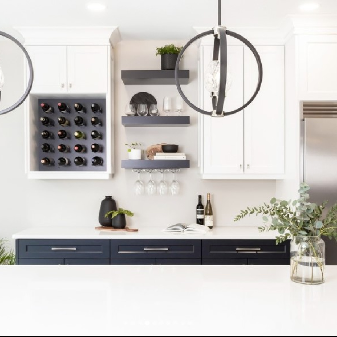 Built-in black wine rack, black floating shelves and white cabinets painted BM Decorator's White - Oak Barrel Cabinetry.