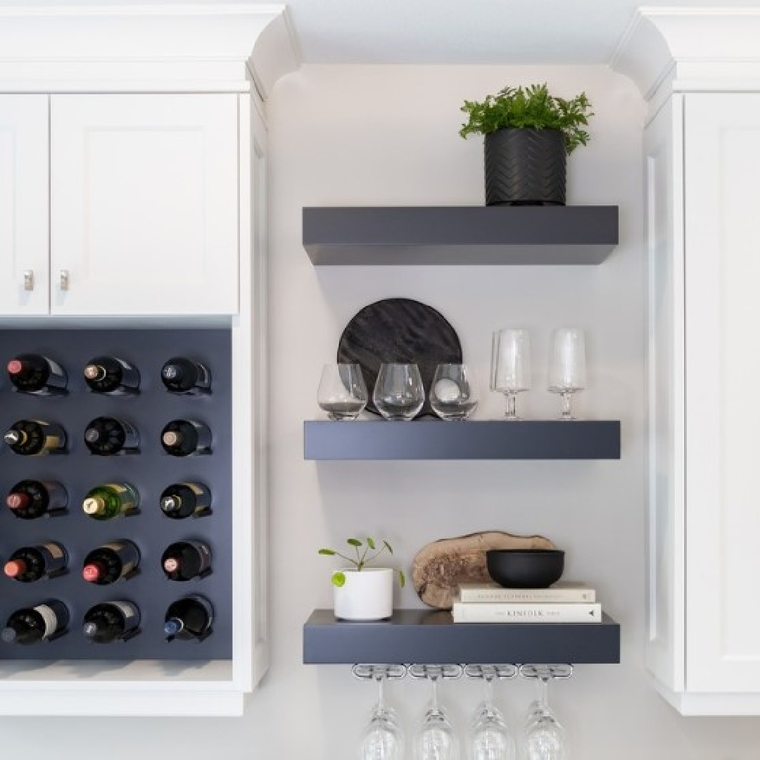 Built-in black wine rack, black floating shelves and white cabinets painted BM Decorator's White - Oak Barrel Cabinetry.