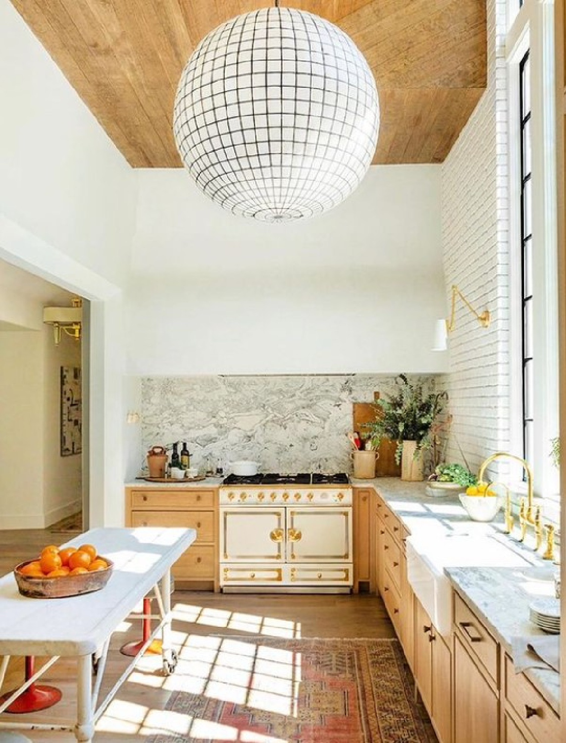 Lofty ceiling in a timeless European inspired kitchen with architecture by Jeffrey Dungan and interior design by Robin Rains - MILIEU.