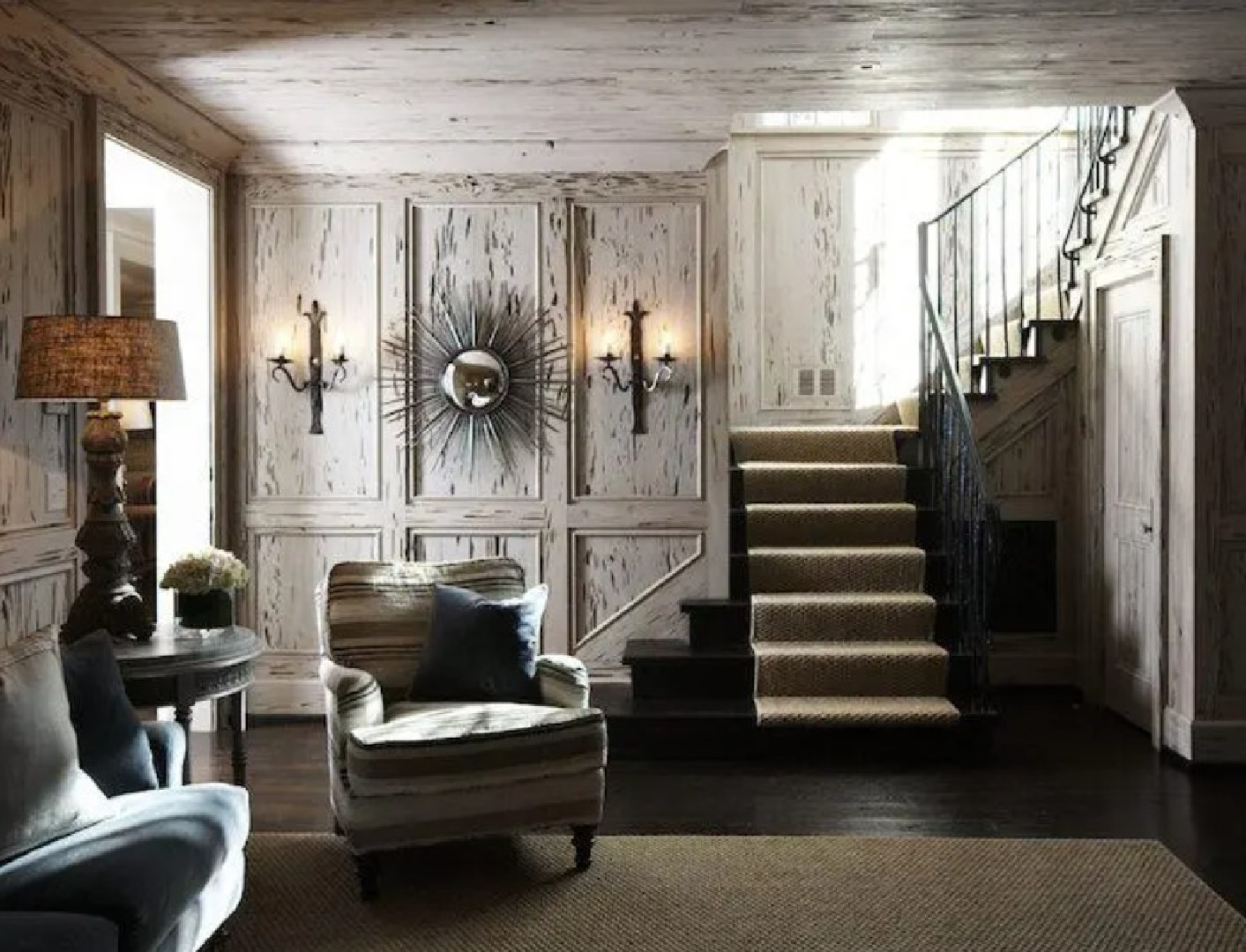 Pecky cypress walls in a living space in Mountain Brook, Alabama with architecture by Jeffrey Dungan.