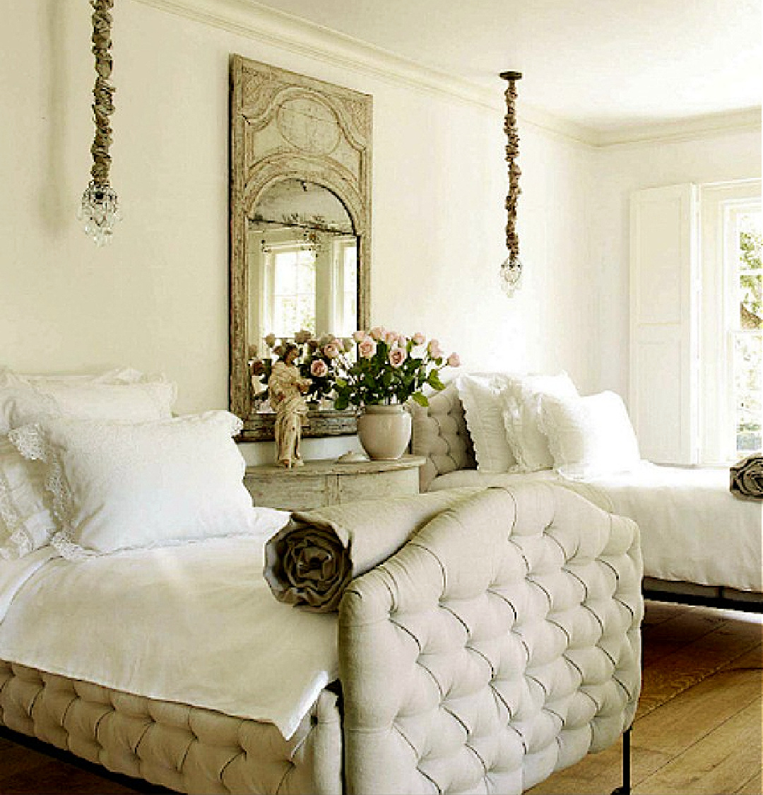 Beautiful French country bedroom with elegant tufted beds, antiques, and design by Pamela Pierce of MILIEU magazine. #pamelapierce #frenchcountrybedroom