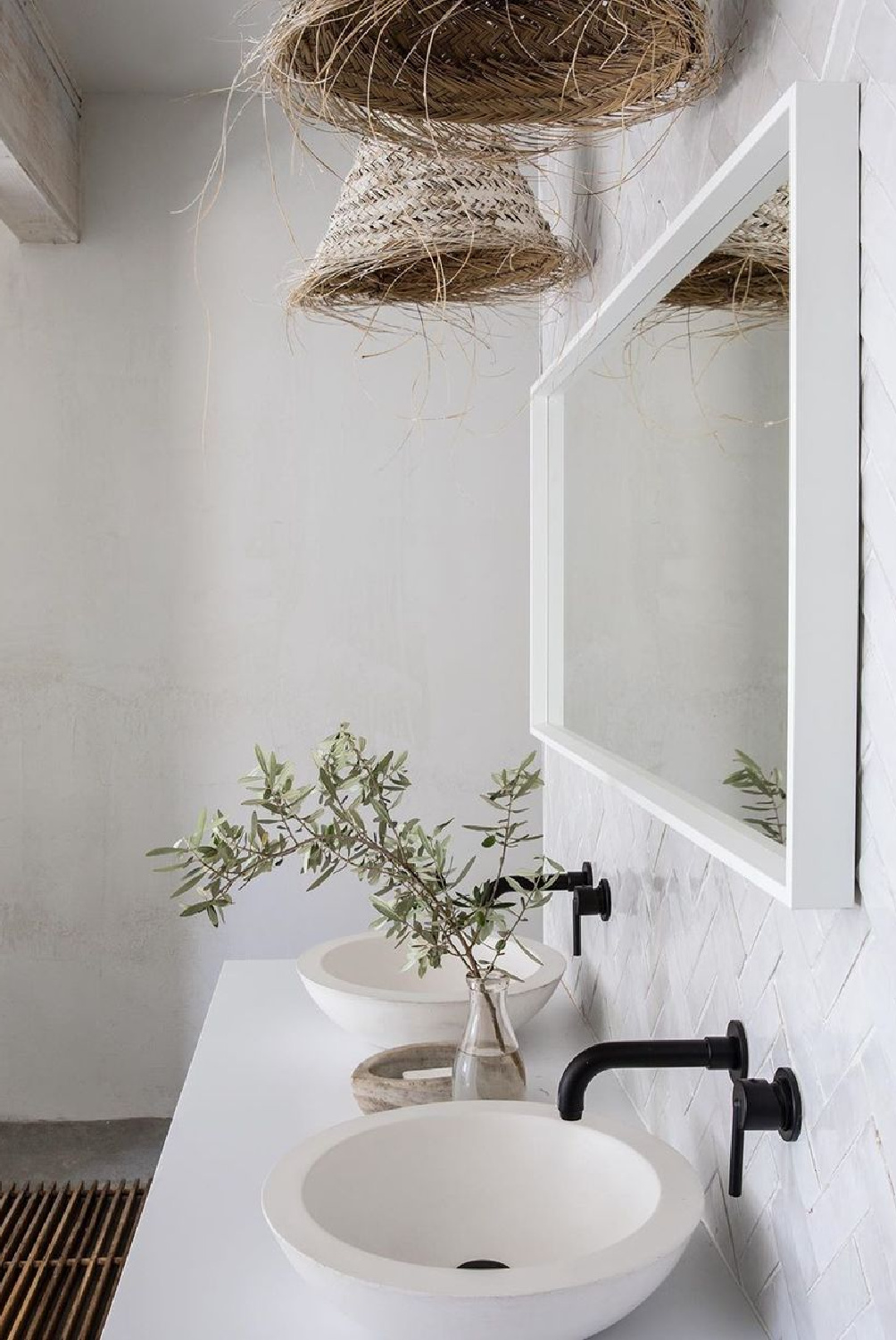 Leanne Ford's warm rustic modern bathroom design with concrete skimmed walls in a master bath by Leanne Ford on HGTV's Rock the Block. ##rusticmodern #organicbathroom #leanneford