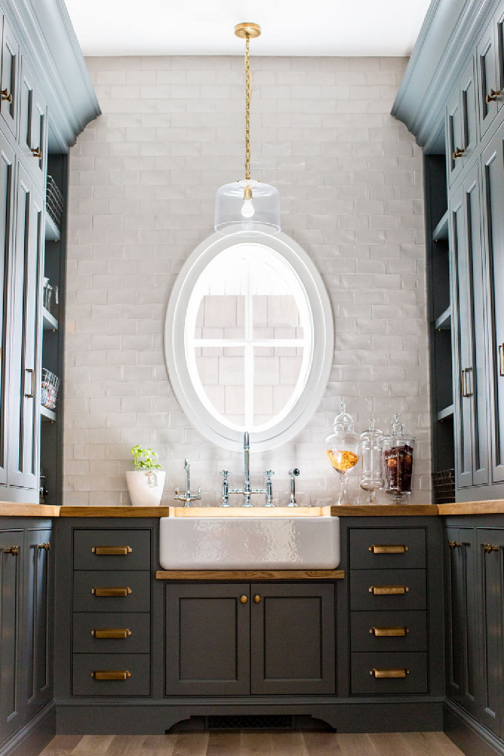 Farrow & Ball Down Pipe painted cabinets in a pantry by Caitlin Creer Interiors. #farrowandballdownpipe