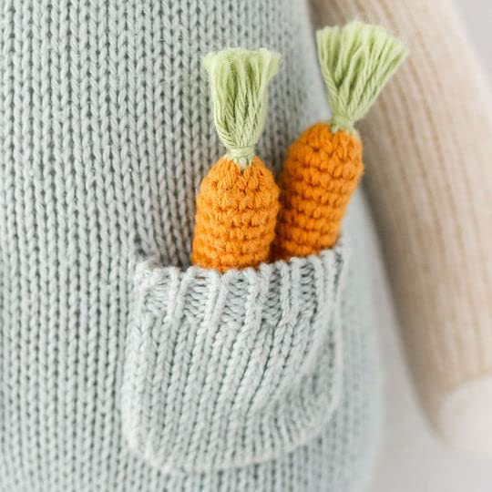 Detail of cuddle + kind Henry the bunny's carrots in pocket