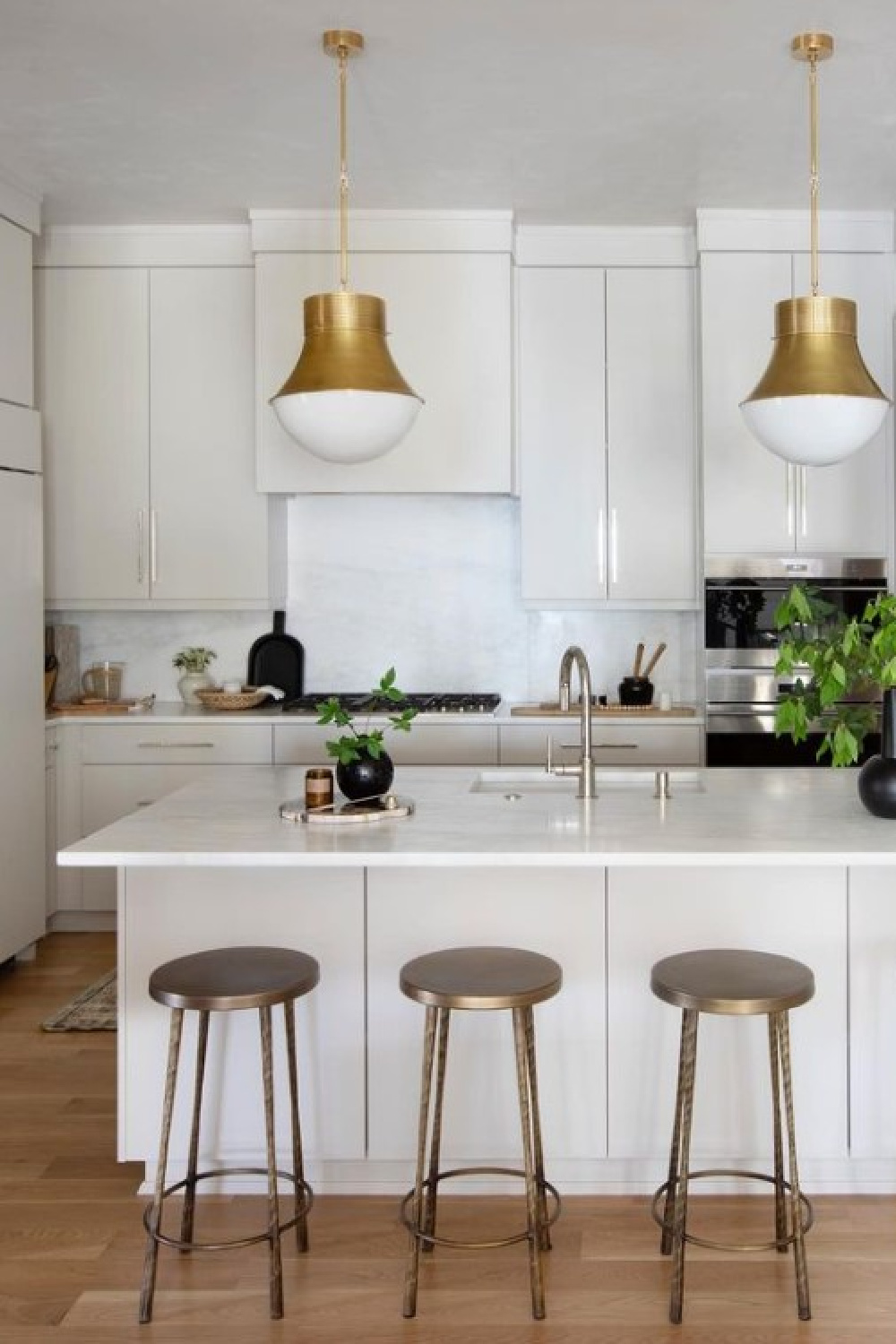 BM Collingwood on kitchen cabinets in a lovely white kitchen by @jlv_creative. #bmcollingwood #whitekitchencabinets