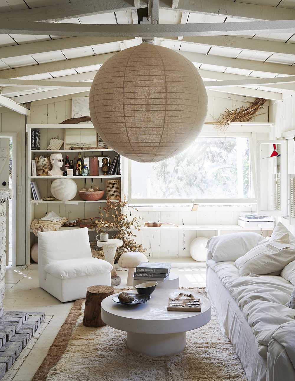 Leanne Ford rustic modern warm interior in a cottage living room she designed - photo by Amy Neunsinger. #leanneford #rusticmodern