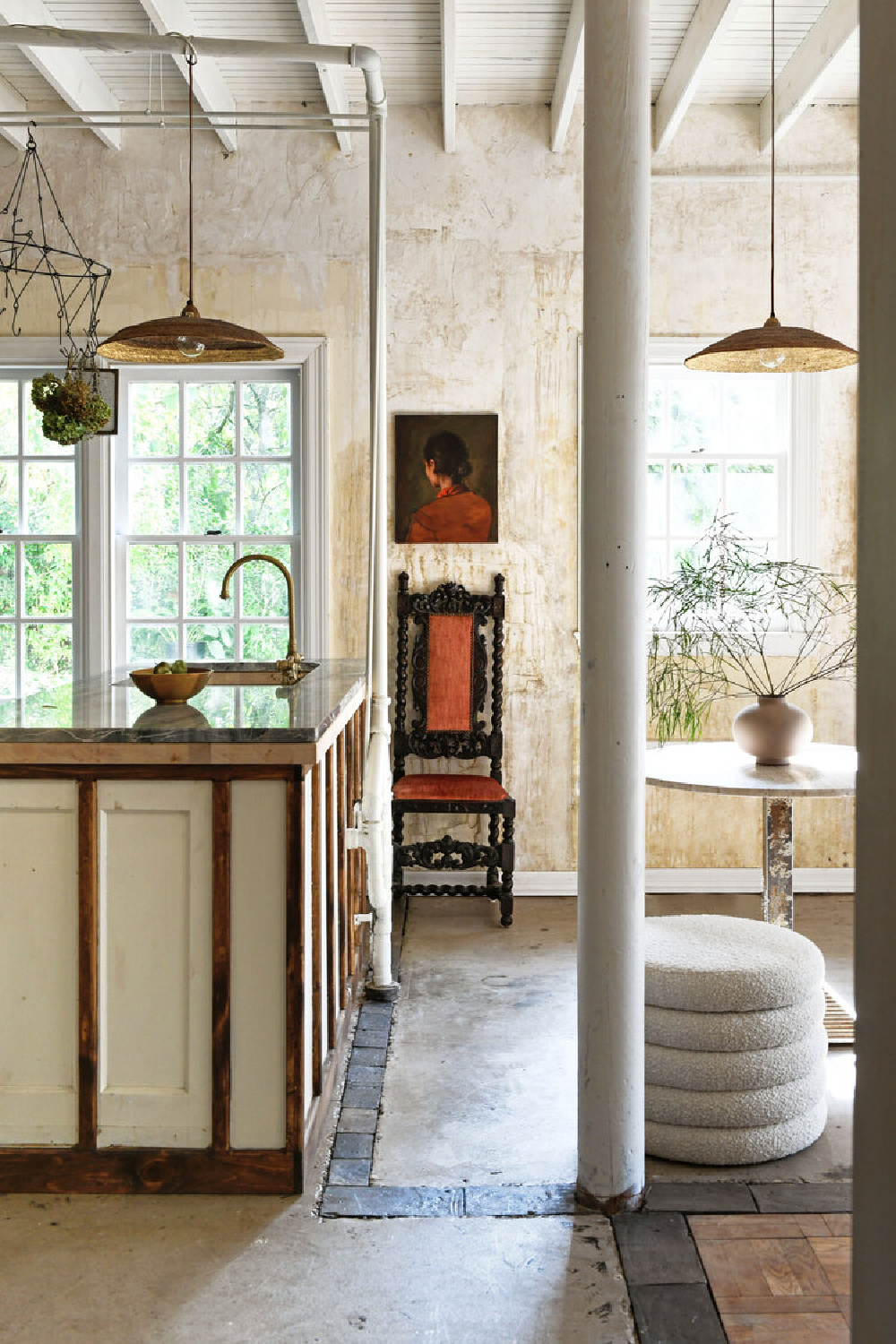 Leanne Ford designed guest cottage with coffee rubbed walls, pieced together rustic brick, cement and wood flooring, and modern rustic decor - photo by Erin Kelly.