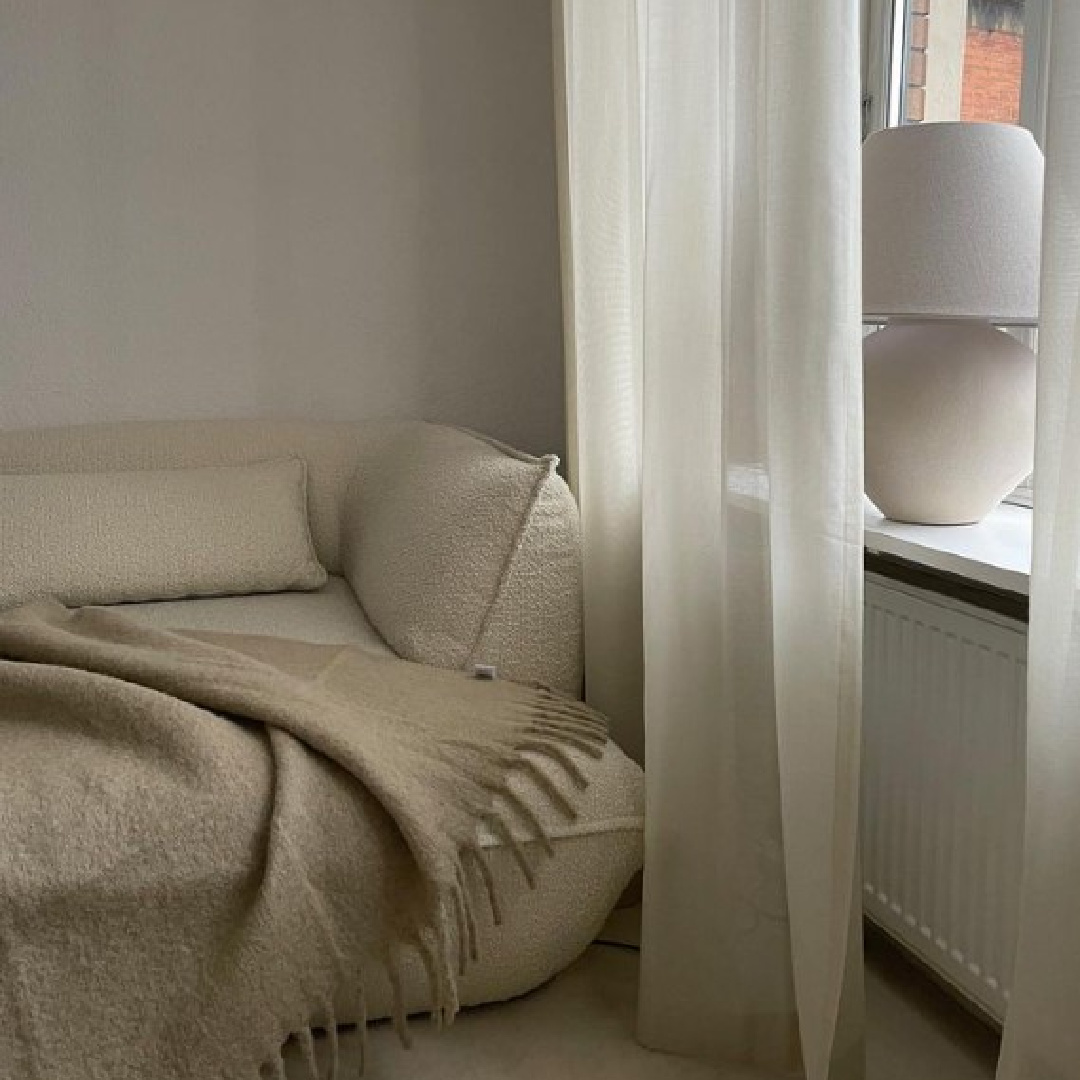Serene neutral cozy Copenhagen living room - @homebymathildenauta. #cozylivingroom #serenedecor