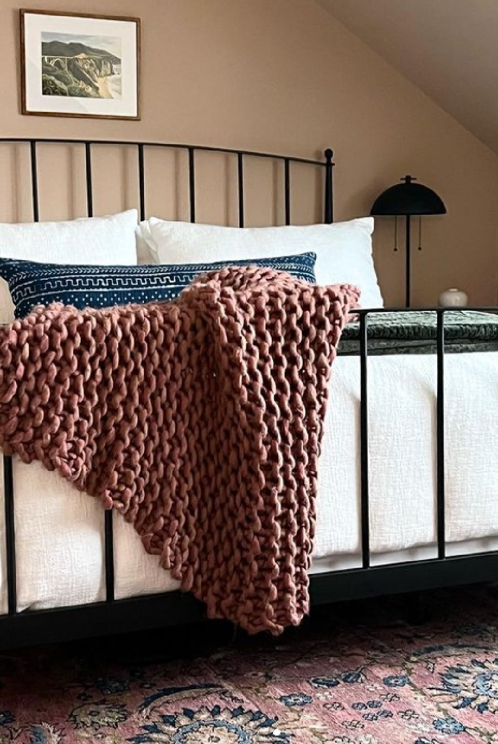 Farrow & Ball Setting Plaster on walls of beautiful bedroom with black bed and design by Sherry Hart. #settingplaster #farrowandballsettingplaster #pinkbedrooms