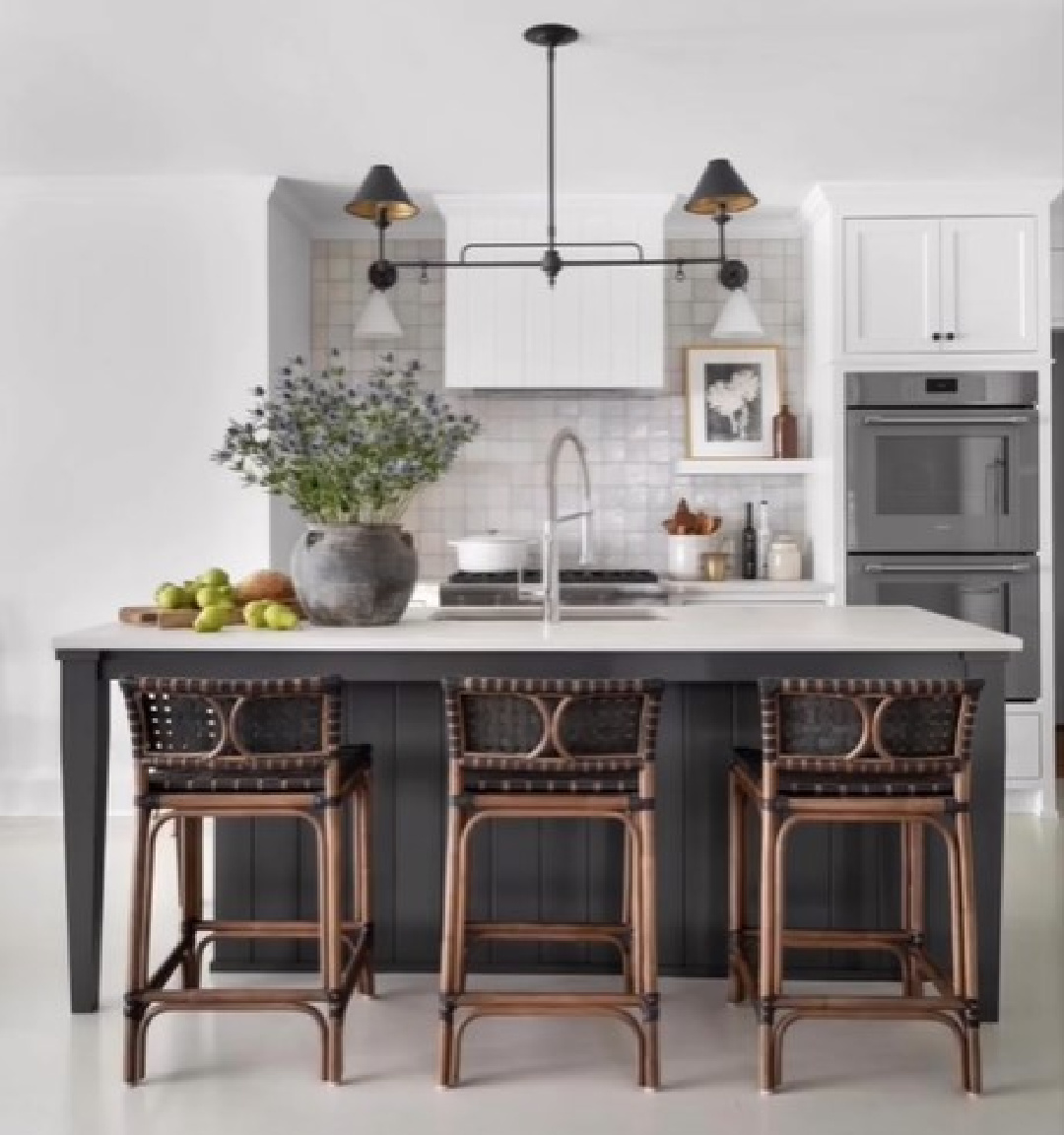 Sherry Hart designed white kitchen with SW Urbane Bronze on island, Emtek hardware, and Circa Lighting.