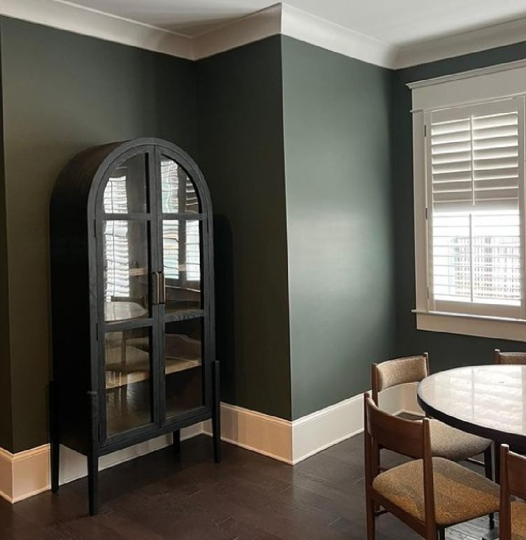 SW Pewter Green on walls of a beautiful space with arched cabinet and design by Sherry Hart. #pewtergreen #moodygreeninteriors