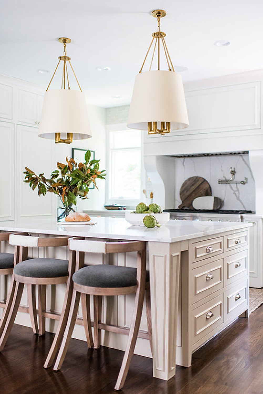 Two tone timeless white kitchen with floating shelves and design by Whittney Parkinson. #floatingshelves #whitekitchens