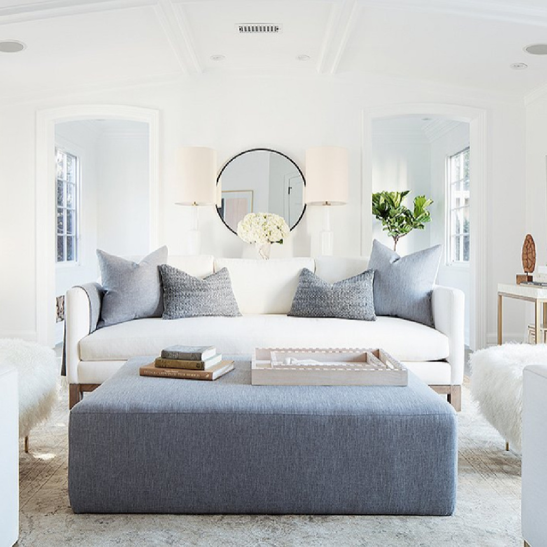 Benjamin Moore Chantilly Lace white living room with blue accents and MCM furnishings - Erin Fetherston. #chantillylace #whitelivingroom