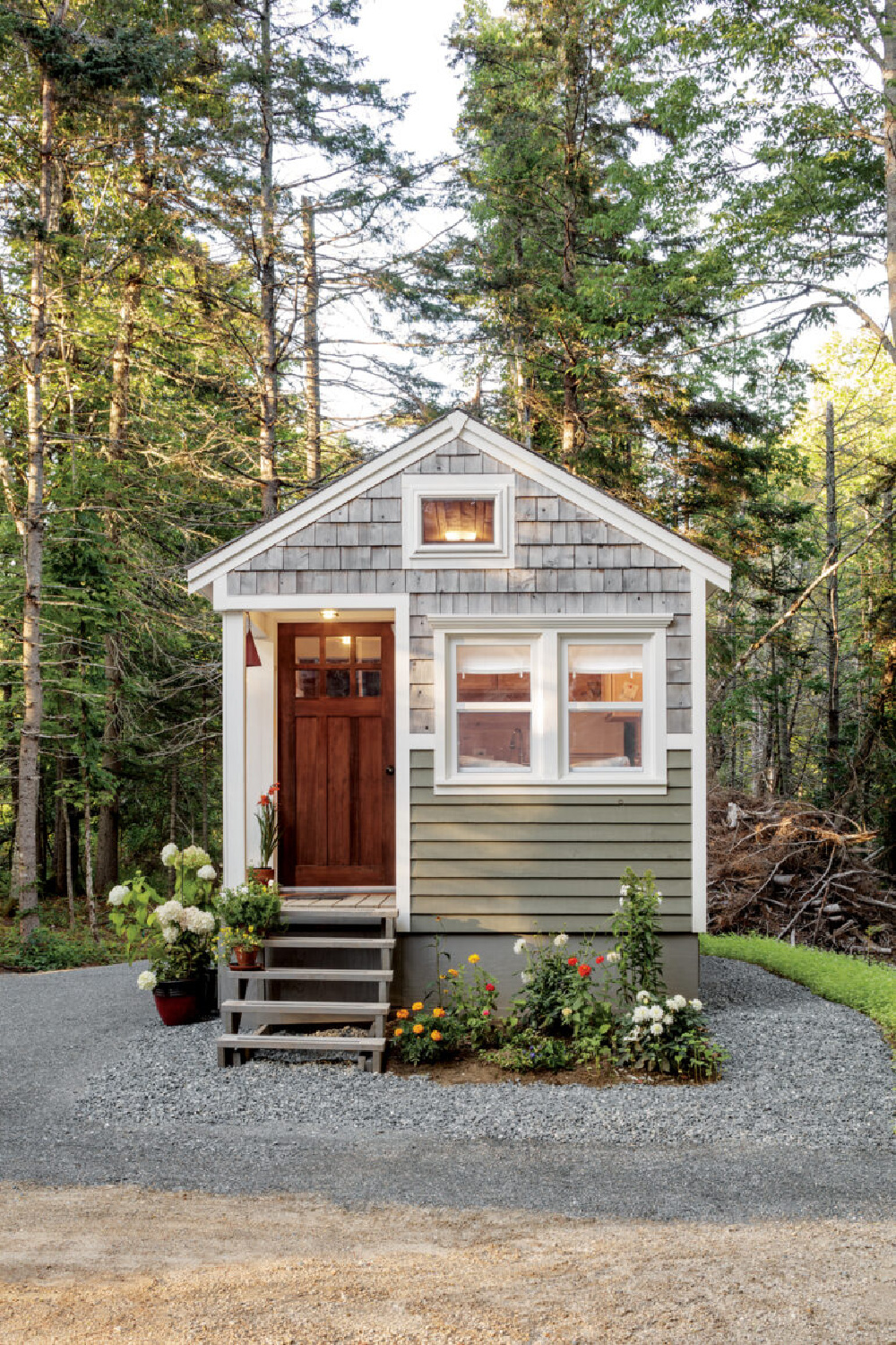 Tiny house cottage with cedar shake shingles and sage green siding  in the woods in Maine - @downeast. #tinyhouses #tinycottages #mainecottage