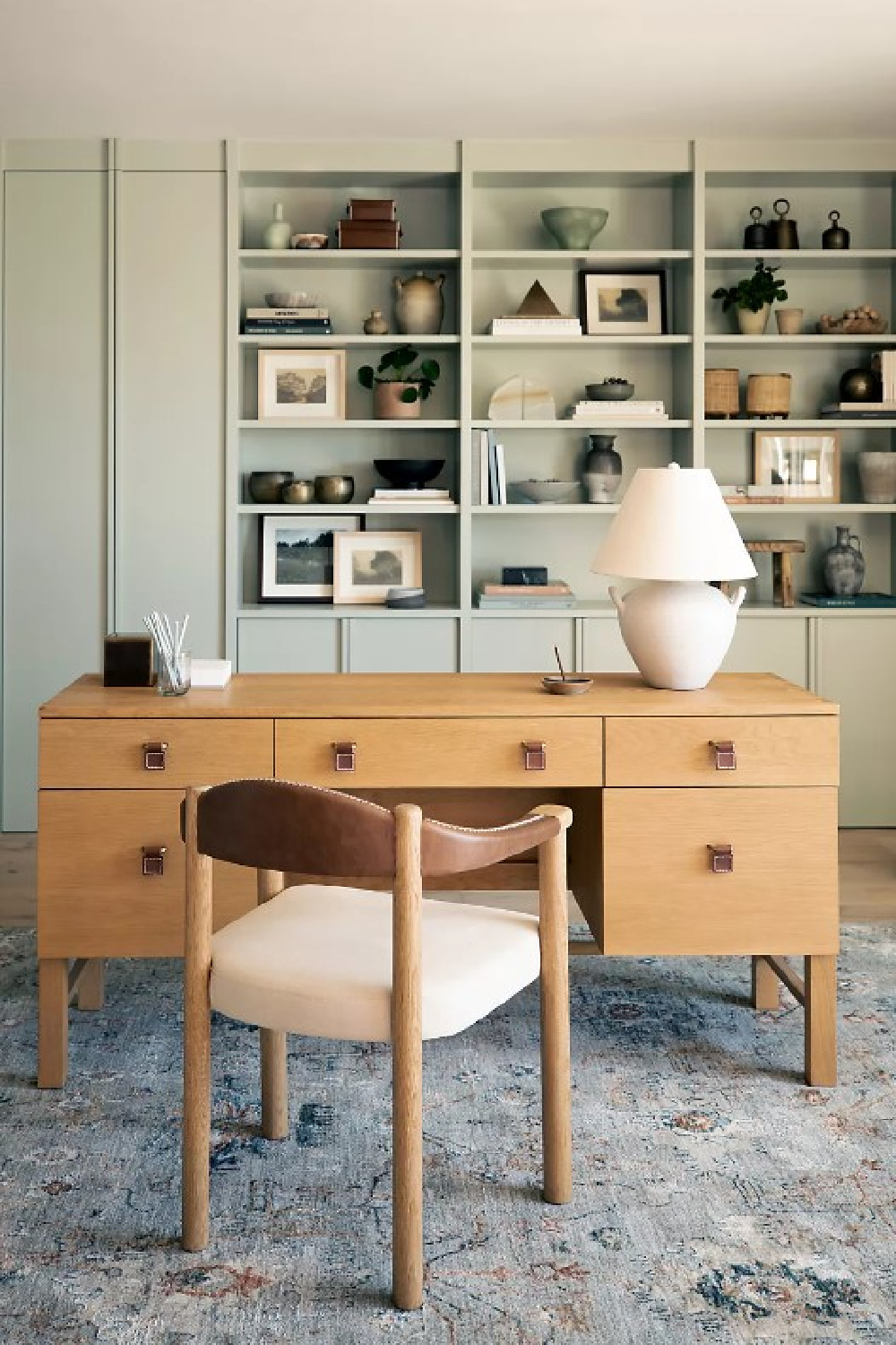 Home office with built-ins, cozy neutral muted colors, Revery Rug (Anthropologie), and design by Amber Lewis. #amberlewis