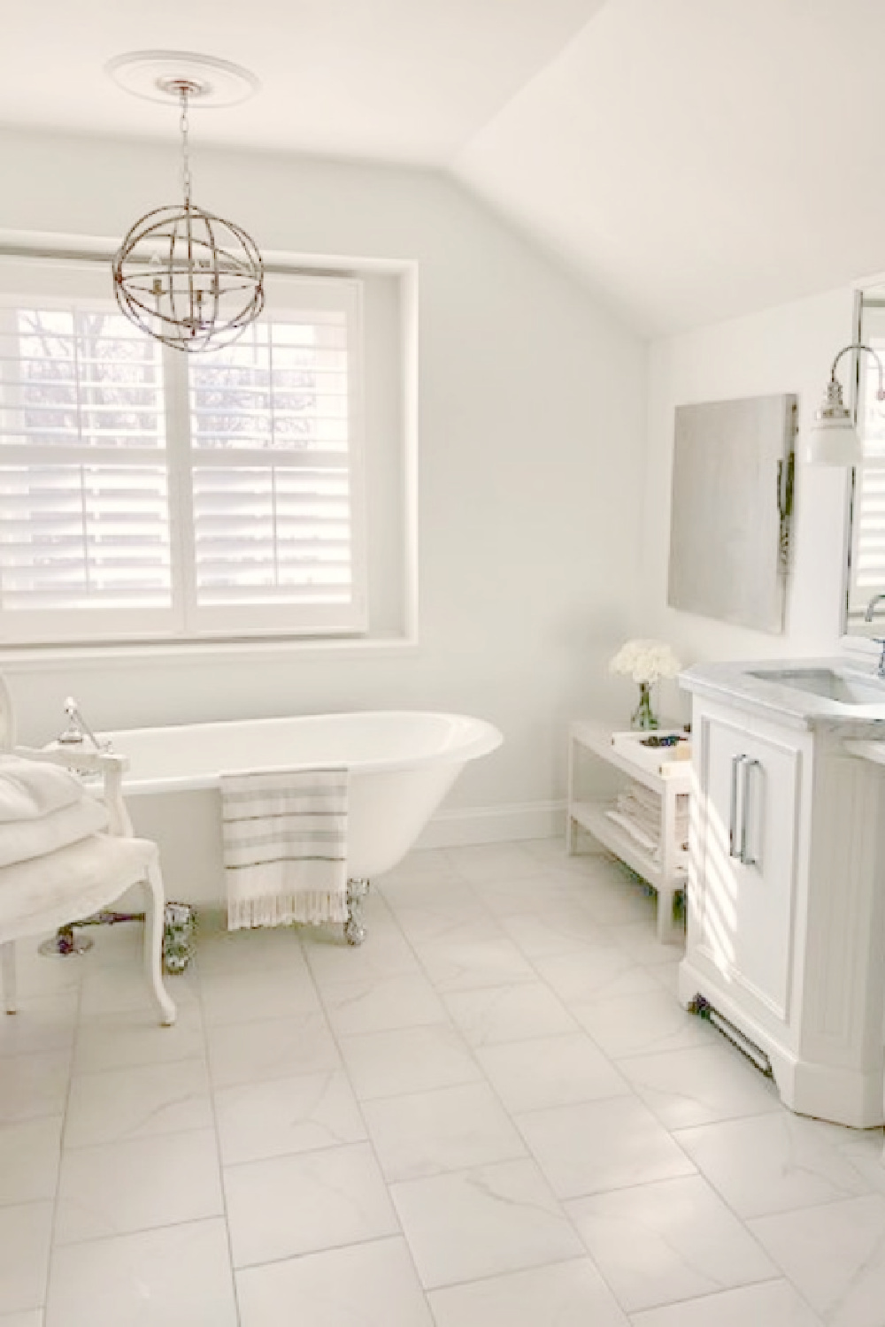 BM White OC-151 in our renovated bath with modern vintage style - Hello Lovely Studio. #bmbrilliantwhite #brilliantwhiteoc150 #brightwhitepaintcolors