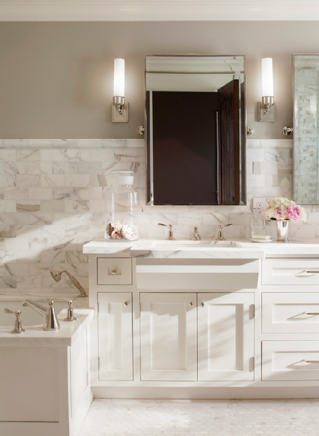 BM Revere Pewter on walls in bathroom design by Scavullo Designs. #bmreverepewter #neutralbathroom