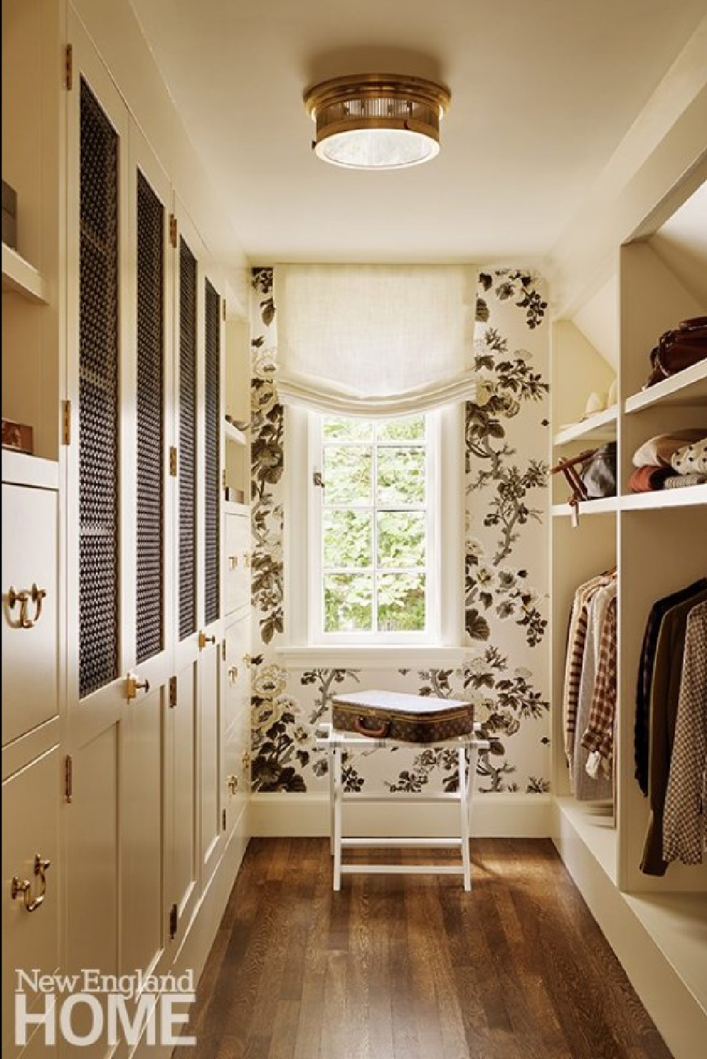 Katie Rosenfeld designed custom closet with Schumacher's Pyne Hollyhock wallpaper (charcoal) and armoire storage - New England Home magazine. #customclosets #pynehollyhock