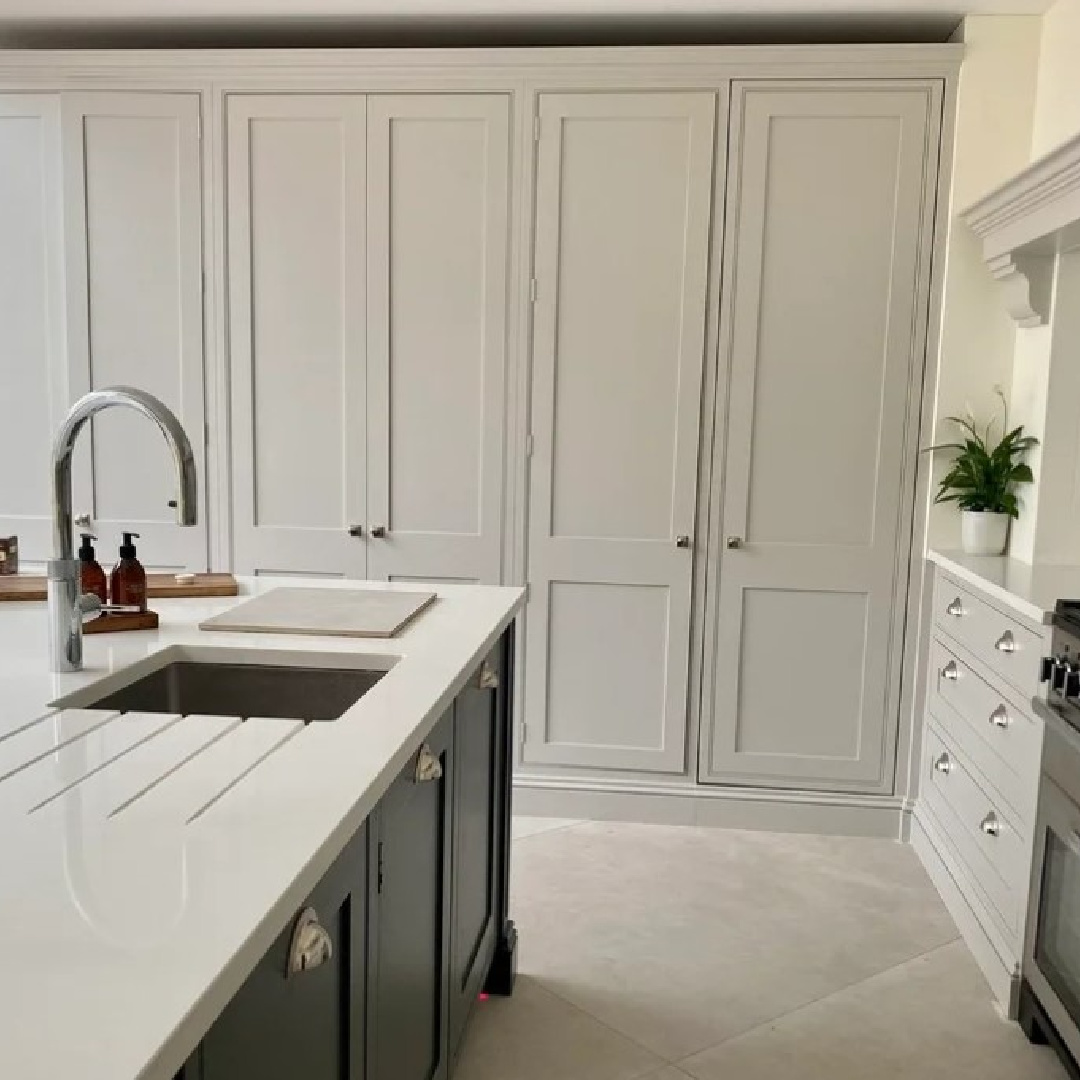 Cornforth White (Farrow & Ball) warm beige kitchen cabinets in an English country kitchen - @Sharon Lacey. #cornforthwhite #farrowandballcornforthwhite #beigepaintcolors