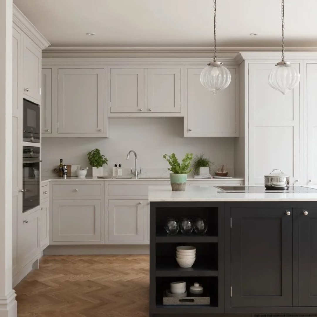 Cornforth White (Farrow & Ball) warm beige kitchen cabinets in an English country kitchen - @thewoodworks. #cornforthwhite #farrowandballcornforthwhite