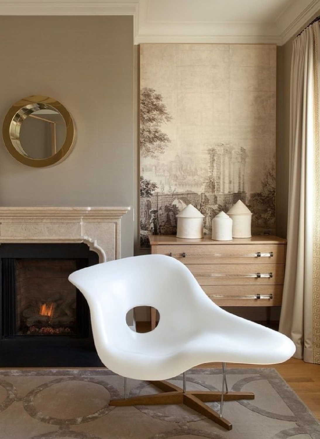 Benjamin Dhong interior design project with Tara Shaw's neoclassical sepia grisaille art panel paired with Eames la Chaise.