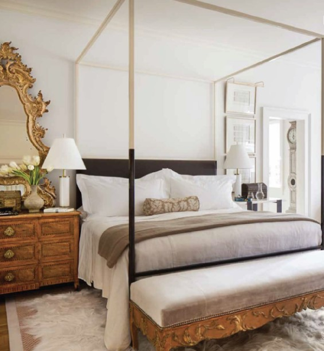 Tara Shaw designed two-tone canopy bed in a gorgeous bedroom with antiques and European inspired style.