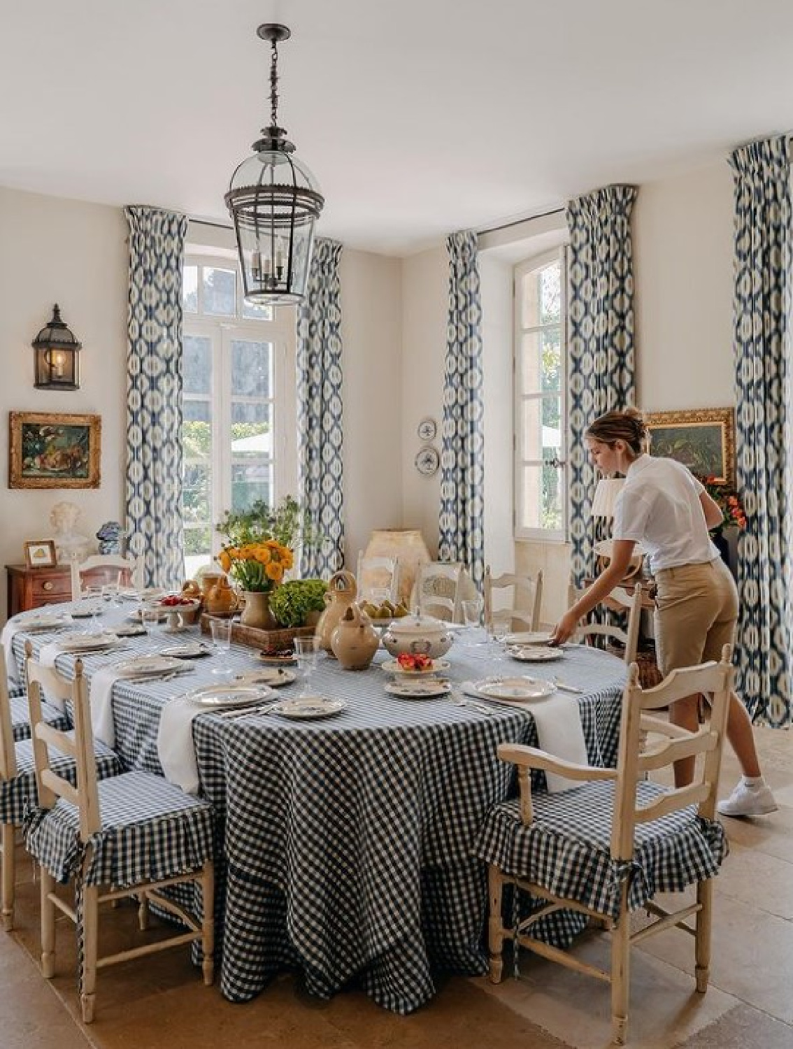 French country dining room with blue and white checks - inside Le Mas des Poiriers, a Rhone Valley renovated farmhouse. @provencepoiriers photo: @angelinalzi